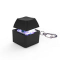 ClickVibe Single Key pocket fidget toy on a desk
